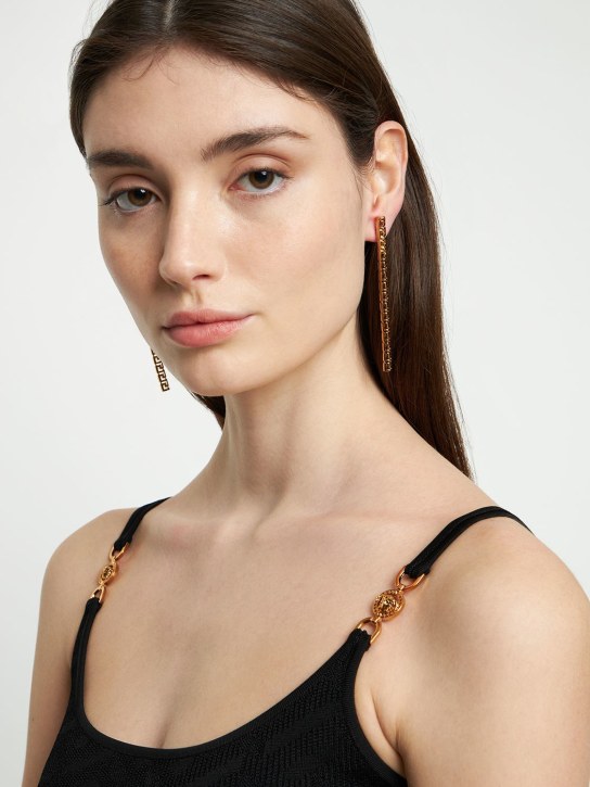 Versace: Boucles d’oreilles asymétriques à motif grecque - Or - women_1 | Luisa Via Roma
