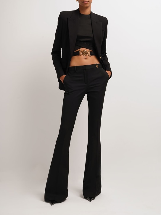 Versace: Wool gabardine flared pants - Black - women_1 | Luisa Via Roma