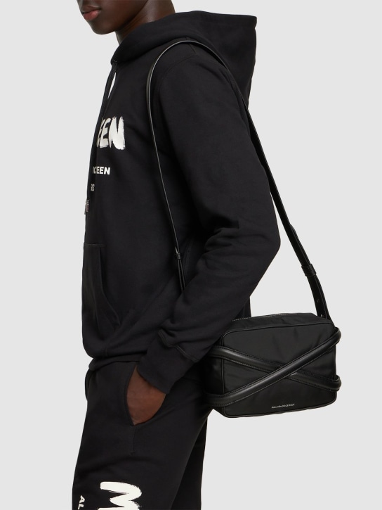 Alexander McQueen: Leather crossbody bag - Black - men_1 | Luisa Via Roma