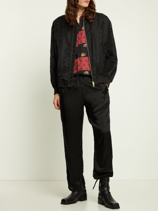 Dries Van Noten: Pantalon loose court Penrith - men_1 | Luisa Via Roma