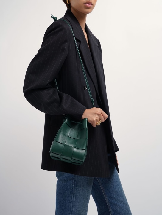 Bottega Veneta: Small Cassette leather bucket bag - Raintree - women_1 | Luisa Via Roma