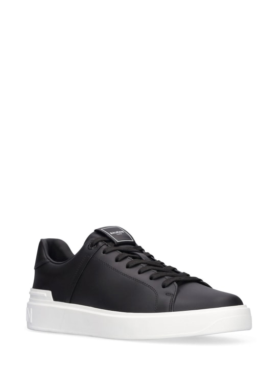 Balmain: B Court leather low top sneakers - Black/White - men_1 | Luisa Via Roma