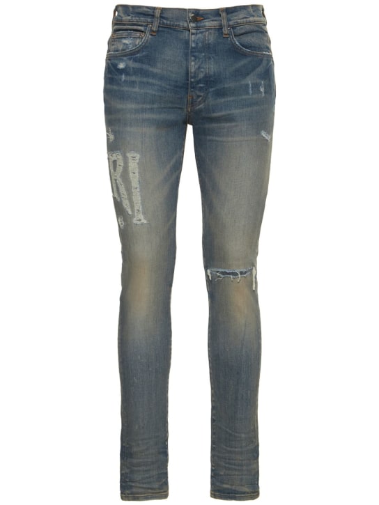 Amiri: Jeans distressed con logo - Clay Indigo - men_0 | Luisa Via Roma
