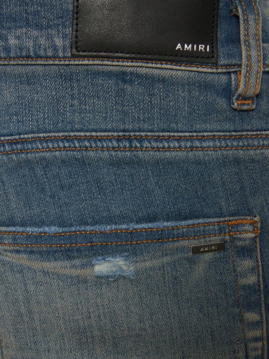 Amiri: Amiri logo distressed jeans - Clay Indigo - men_1 | Luisa Via Roma
