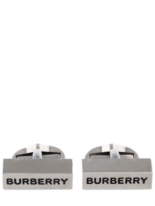 Burberry: Engraved Burberry logo cufflinks - Silver/Black - men_1 | Luisa Via Roma