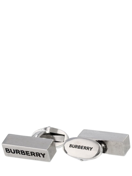 Burberry: Engraved Burberry logo cufflinks - Silver/Black - men_0 | Luisa Via Roma