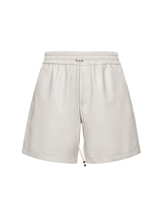 Amiri: Shorts con logo - Bronce - men_0 | Luisa Via Roma