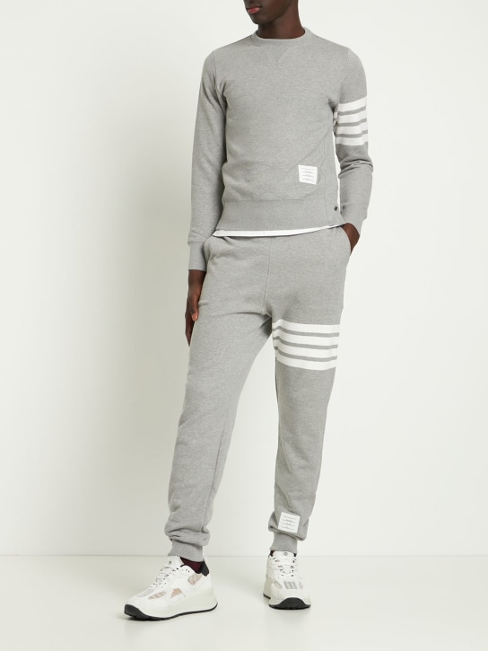 Thom Browne: Intarsia stripes cotton sweatpants - Light Grey - men_1 | Luisa Via Roma