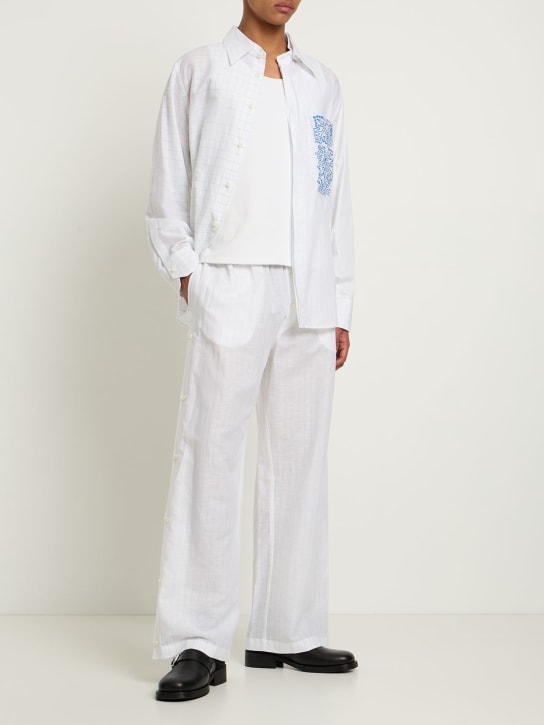 Federico Cina: Hose aus Baumwolle und Leinen mit Traubendruck - Wollweiß - men_1 | Luisa Via Roma