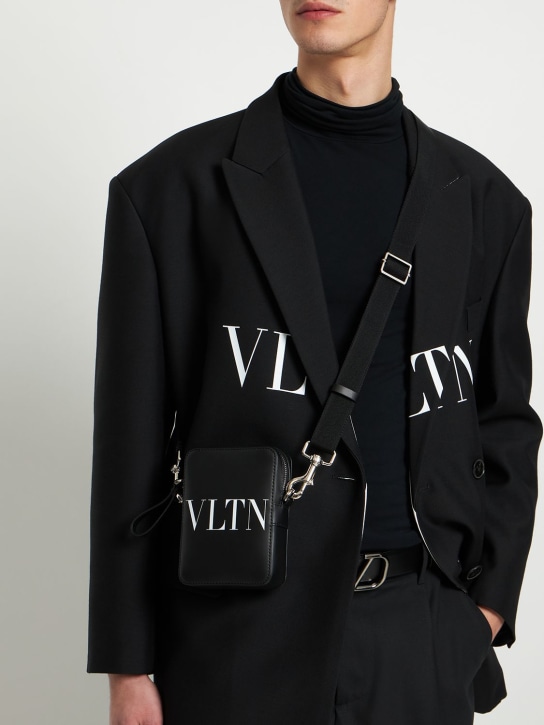 Valentino Garavani: VLTN small leather crossbody bag - Black/White - men_1 | Luisa Via Roma