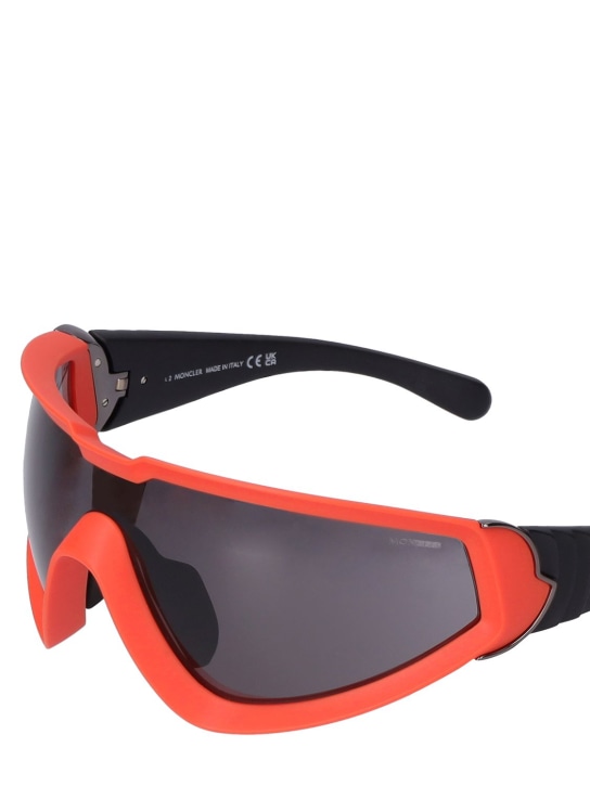 Moncler: Wrapid futuristic shape sunglasses - Orange/Smoke - men_1 | Luisa Via Roma