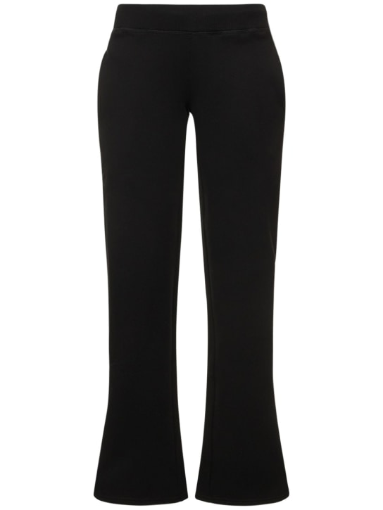 Mowalola: Logo印花棉质平纹针织运动裤 - 黑色 - men_0 | Luisa Via Roma