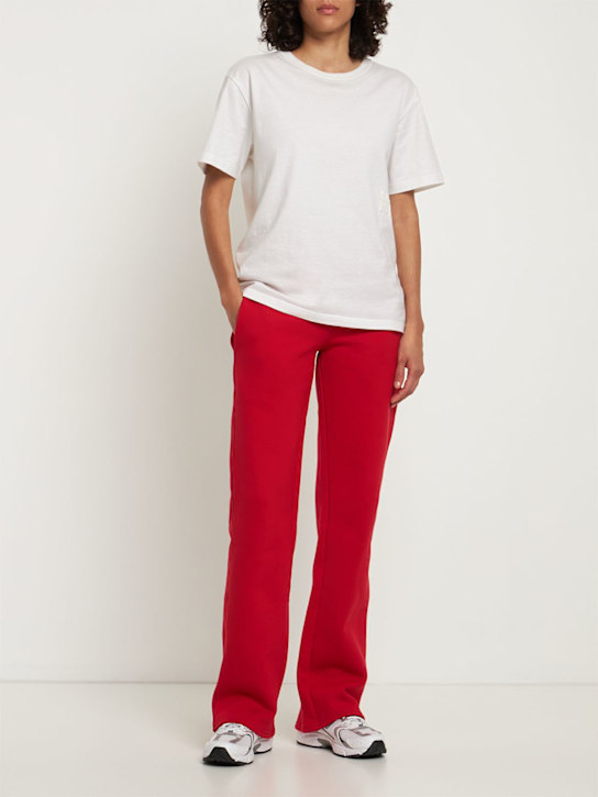 Mowalola: Logo印花棉质平纹针织运动裤 - 红色 - women_1 | Luisa Via Roma