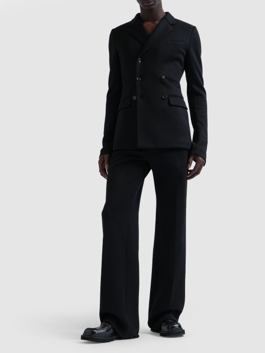 Dolce&Gabbana: Pantalones anchos de jersey de algodón - Negro - men_1 | Luisa Via Roma