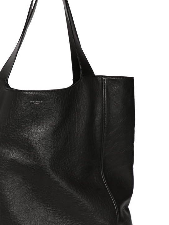 Saint Laurent: Maxi Saint Laurent leather tote bag - Black - men_1 | Luisa Via Roma