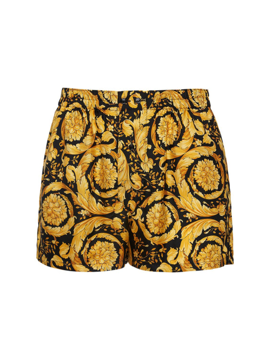 Versace: Shorts de seda con estampado - Negro/Dorado - men_0 | Luisa Via Roma