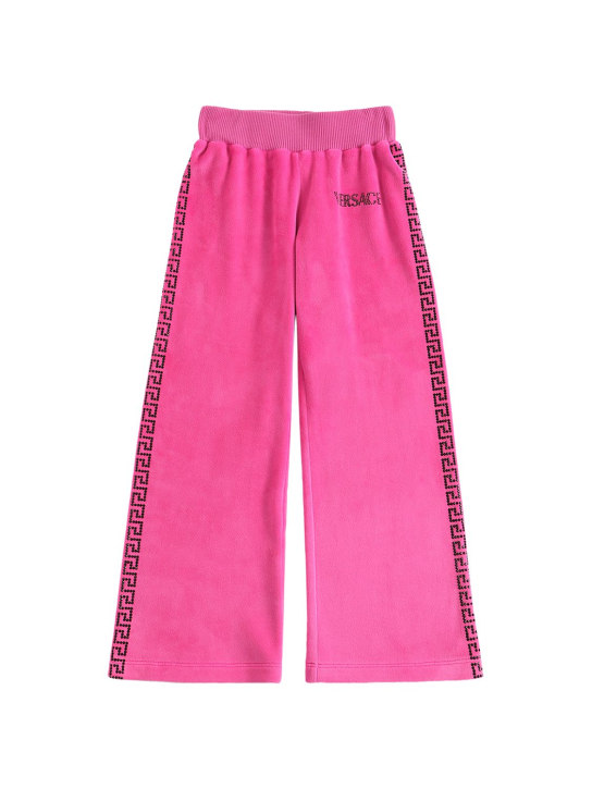 Versace: Pantaloni in velluto con logo decorato - Fucsia - kids-girls_0 | Luisa Via Roma