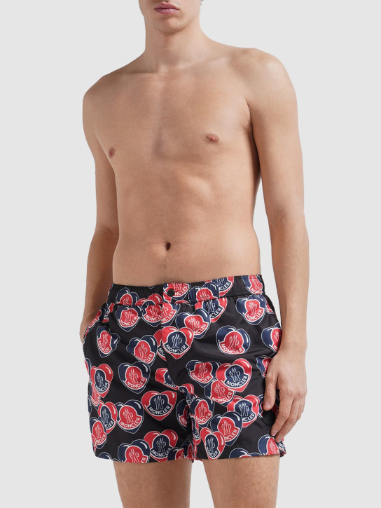 Moncler: Heart printed tech swim shorts - Black/Multi - men_1 | Luisa Via Roma