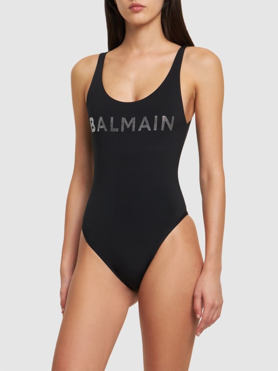 Balmain: Bañador entero de jersey con logo y cristales - Negro - women_1 | Luisa Via Roma