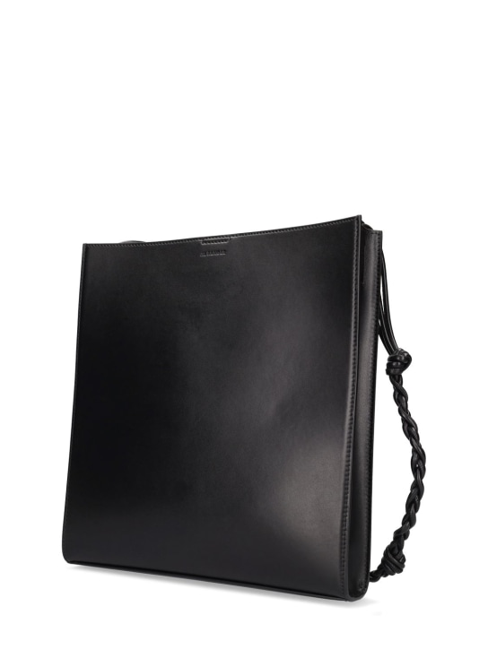 Jil Sander: Medium Tangle leather crossbody bag - Black - men_1 | Luisa Via Roma