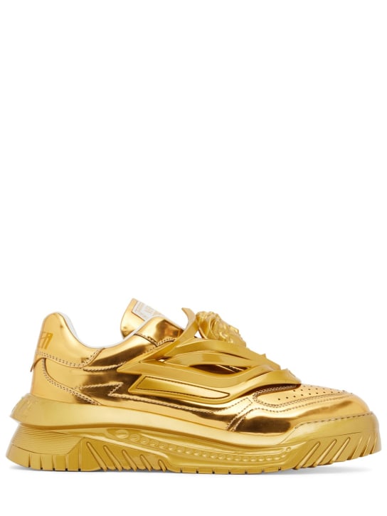 Versace: Metallic leather sneakers - Gold - men_0 | Luisa Via Roma