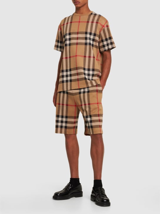 Burberry: Ferryfield Check print sweat shorts - Archive Beige - men_1 | Luisa Via Roma
