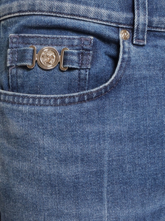 Versace: Jeans de denim de algodón lavados a piedra - Azul - men_1 | Luisa Via Roma