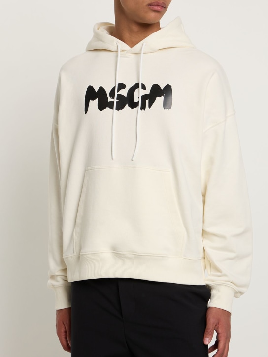 MSGM: Brush stroke logo French terry hoodie - Cream/Black - men_1 | Luisa Via Roma