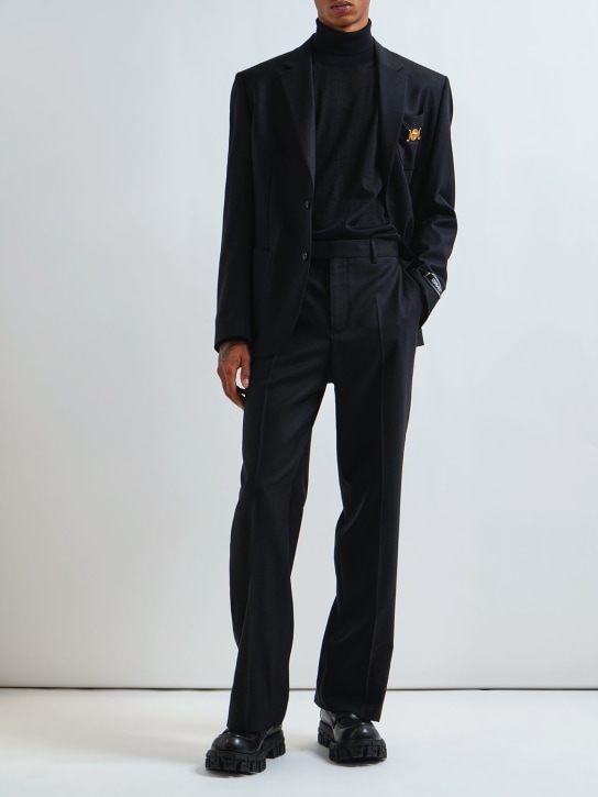 Versace: Strickpullover aus Wollmischung mit Logo - Schwarz - men_1 | Luisa Via Roma