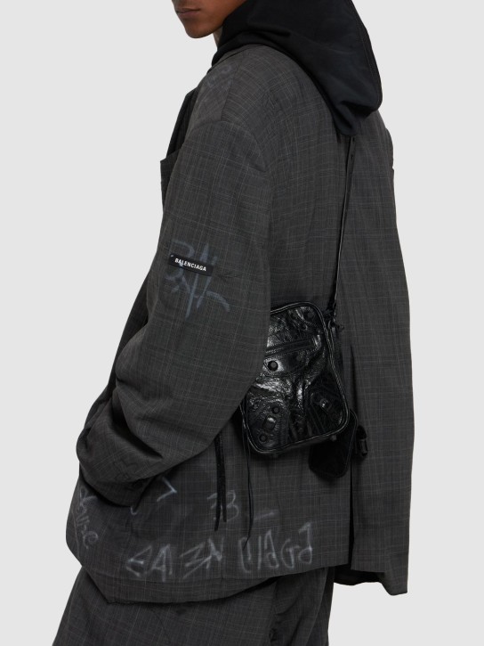 Balenciaga: Medium Le Cagole leather crossbody bag - Black - men_1 | Luisa Via Roma