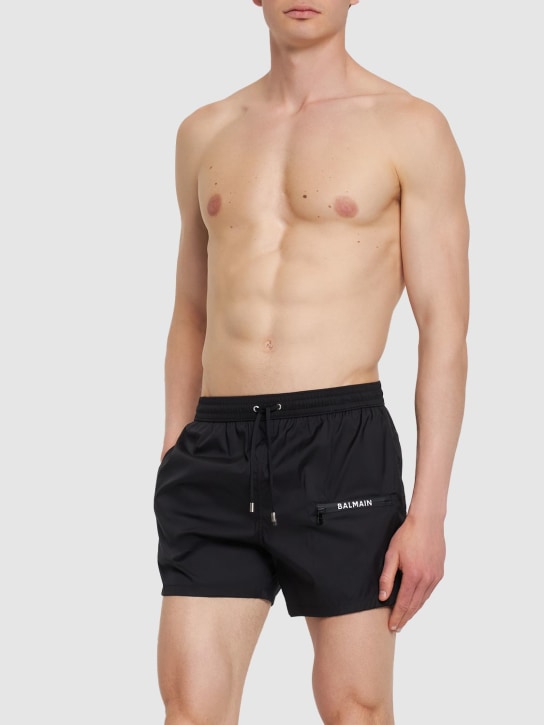 Balmain: Logo boxer swim shorts - Black - men_1 | Luisa Via Roma