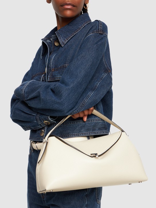 Toteme: T-Lock grain leather top handle bag - Milk Grain - women_1 | Luisa Via Roma