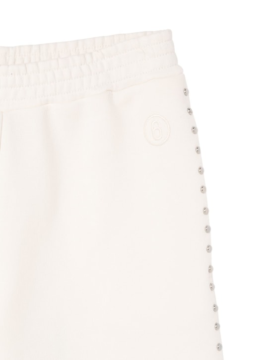 MM6 Maison Margiela: Pantaloni in jersey di cotone con borchie - Bianco - kids-girls_1 | Luisa Via Roma