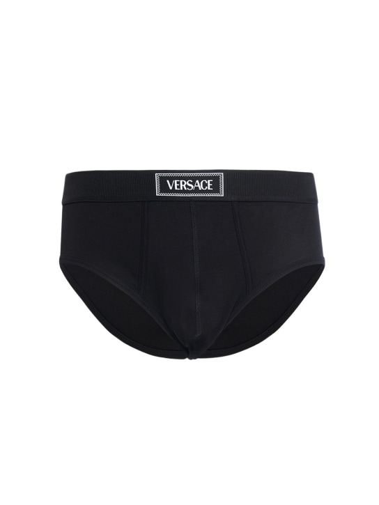 Versace Underwear: Calzonzillos slip de jersey de algodón con logo - Negro - men_0 | Luisa Via Roma