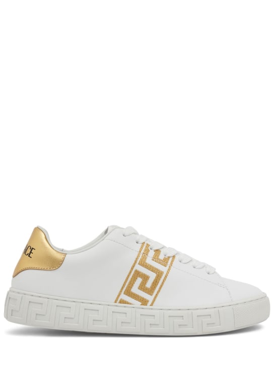 Versace: Faux leather sneakers w/ embroidery - White/Gold - women_0 | Luisa Via Roma