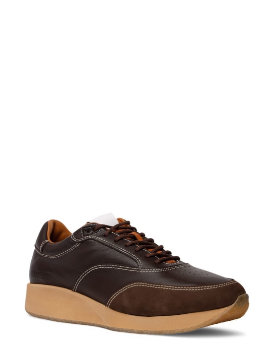 Jacquemus: La Daddy leather sneakers - men_1 | Luisa Via Roma
