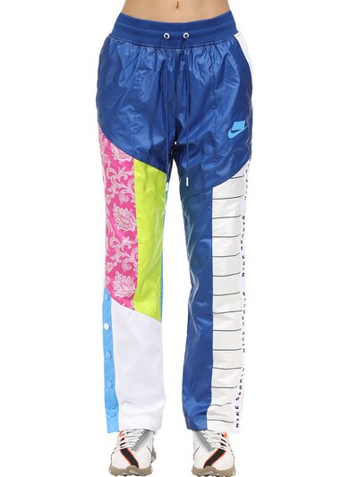 nike pants with buttons on the side