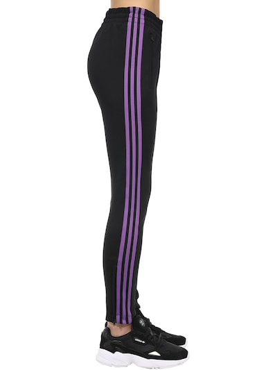 purple stripe adidas pants