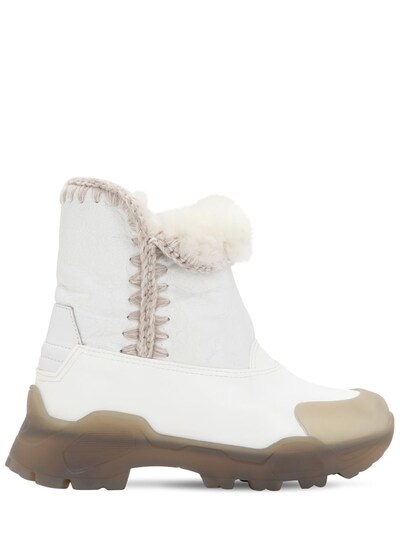 white eskimo boots