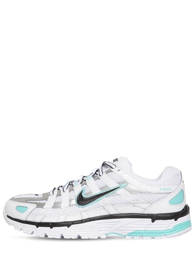 white and aqua nike shoes