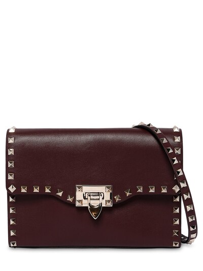 Valentino Garavani Rockstud Embellished Leather Bag In Rubin