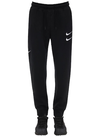 nike pants with buttons on the side