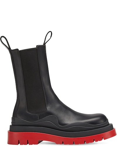 black boots red sole