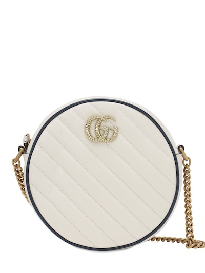 white circle gucci purse