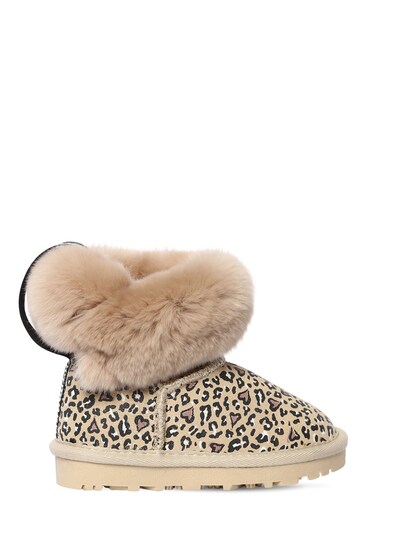 Leopard print faux fur boots 