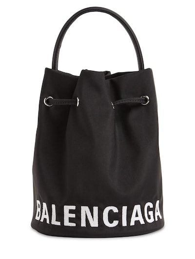 Balenciaga - Xs wheel logo print nylon bucket bag - Black | Luisaviaroma