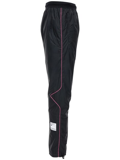 nike track pants pink