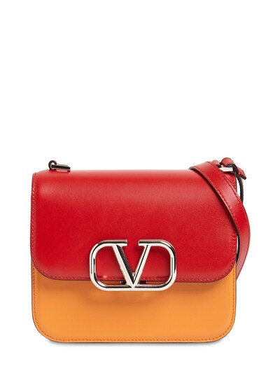 red leather bag