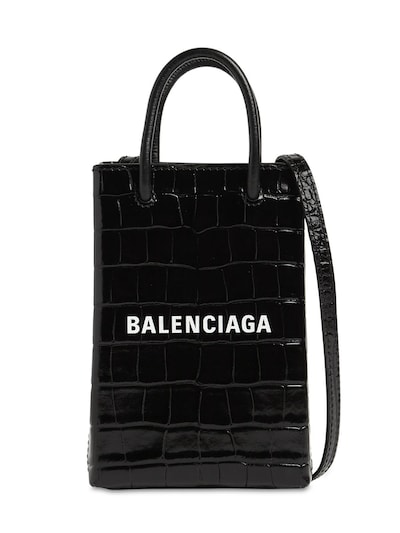 Shopping embossed leather phone holder - Balenciaga - Women | Luisaviaroma