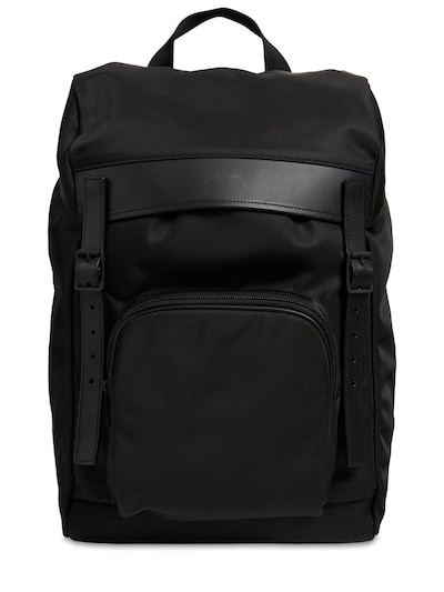 leather flap backpack